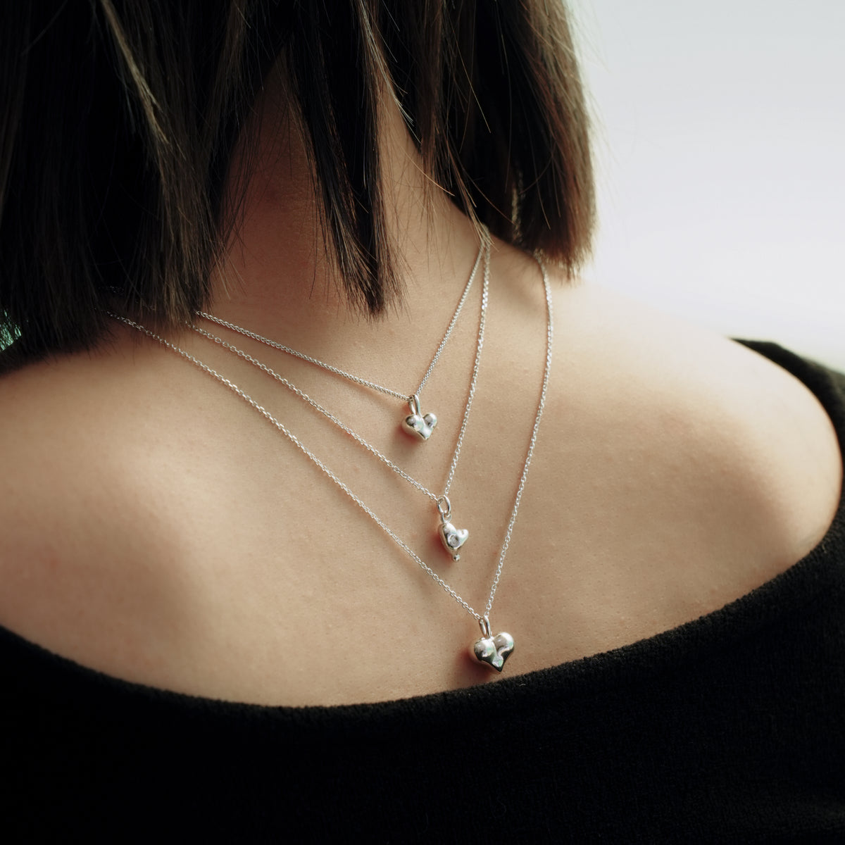 Cheeky Heart Necklace, small sterling silver heart pendant detail