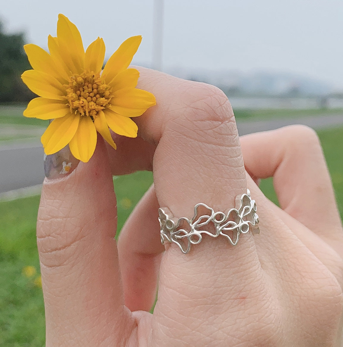 Lilac Ring worn on the hand