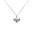Cheeky Big Heart Necklace, a puffed sterling silver heart pendant on a fine silver chain
