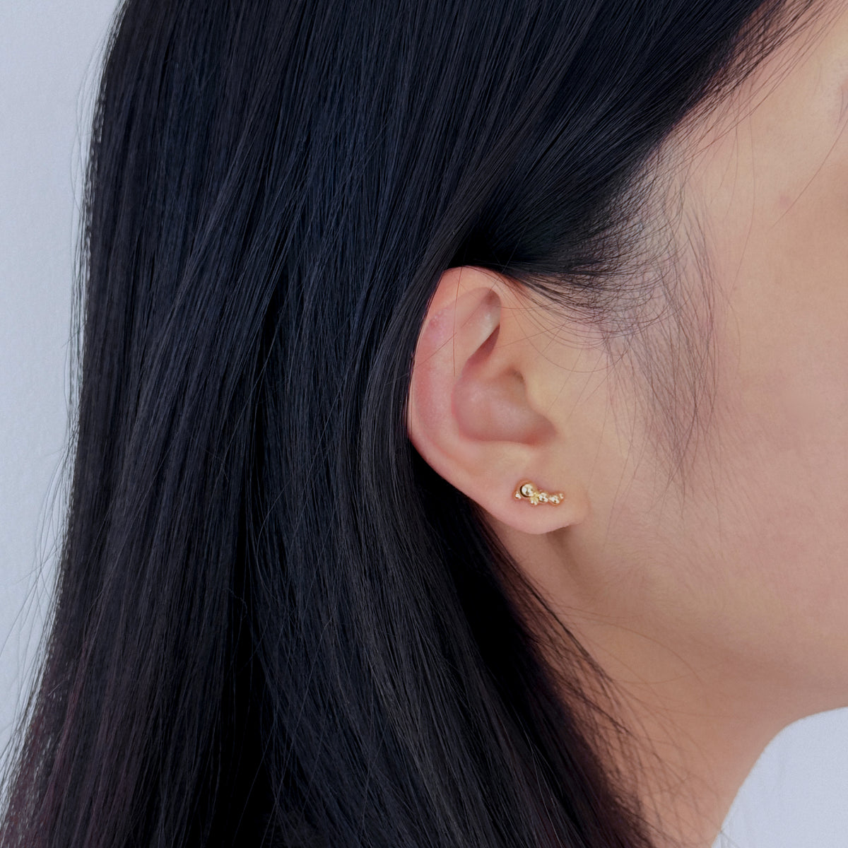 Fizzy Studs in 14k gold worn