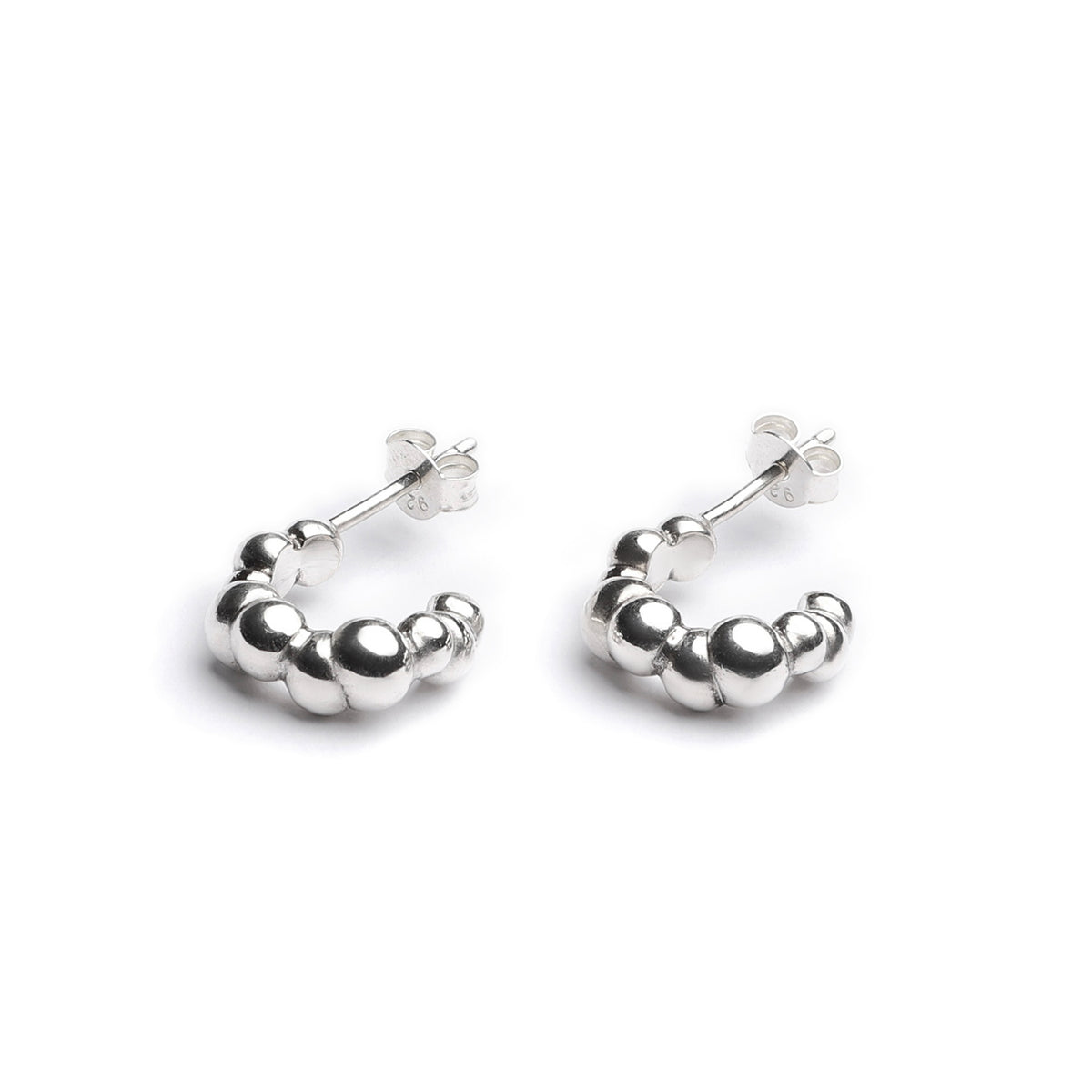 Bubbly Huggie Earrings, beaded sterling silver huggie hoops seen from another angle
