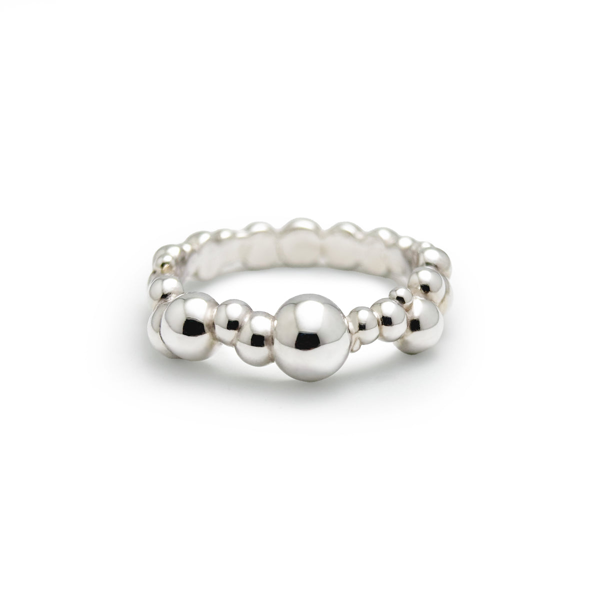 Bubbly Ring, a sterling silver band formed from graduated round silver beads