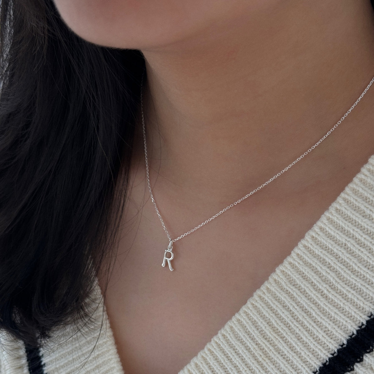 Yours Truly Initial necklace worn