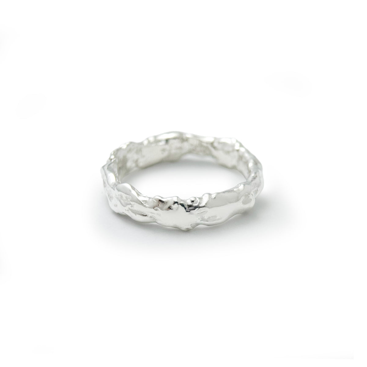Molten Band Ring, wide textured sterling silver band on a white background
