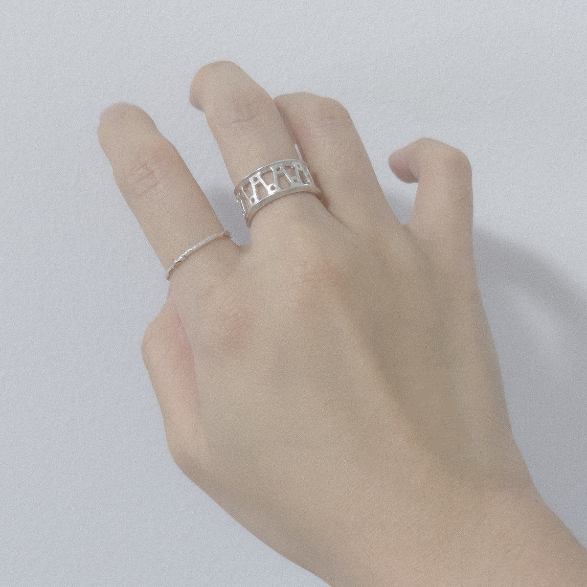 Orbit Ring worn on the hand