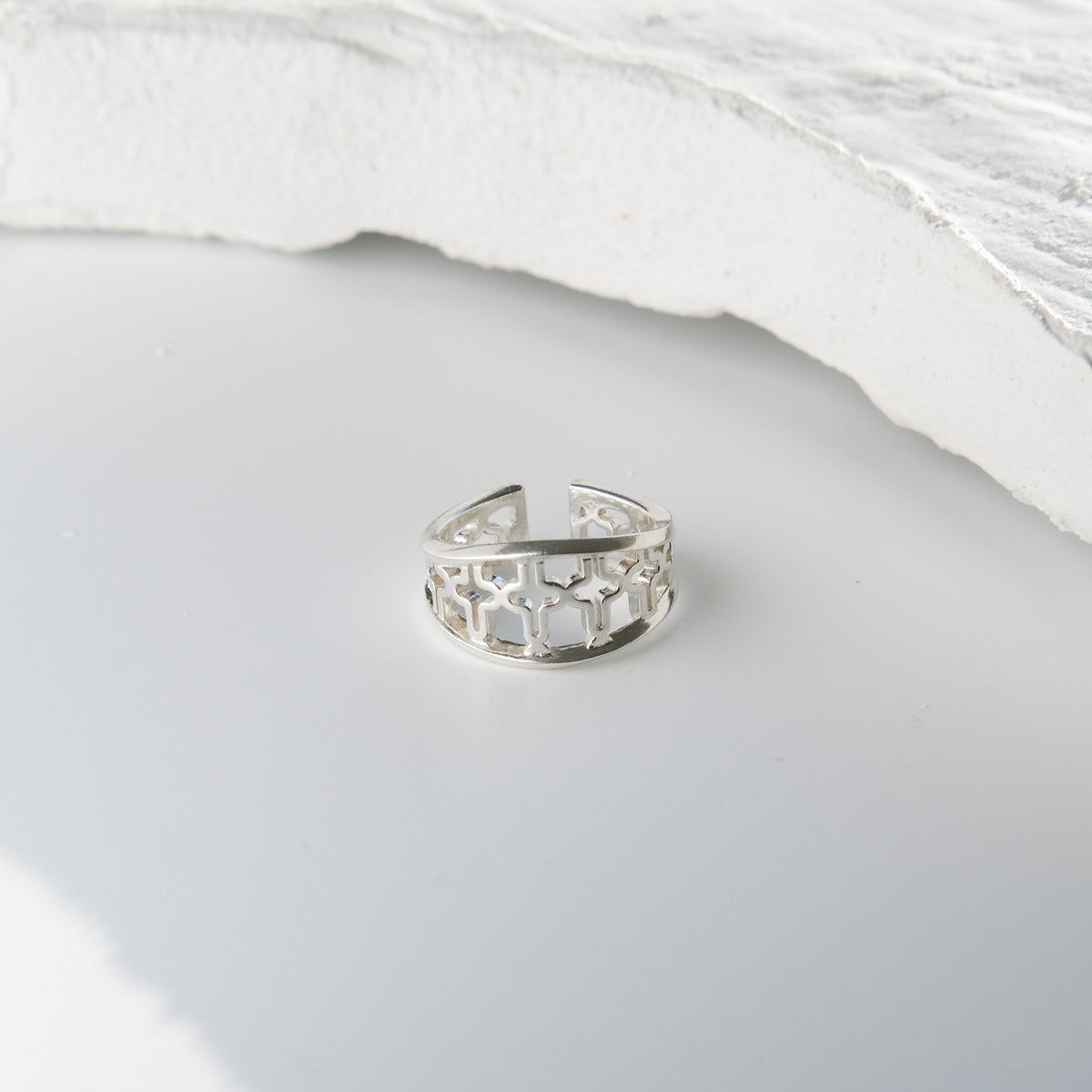 Starlight Ring, sterling silver star cutout cuff seen from another angle