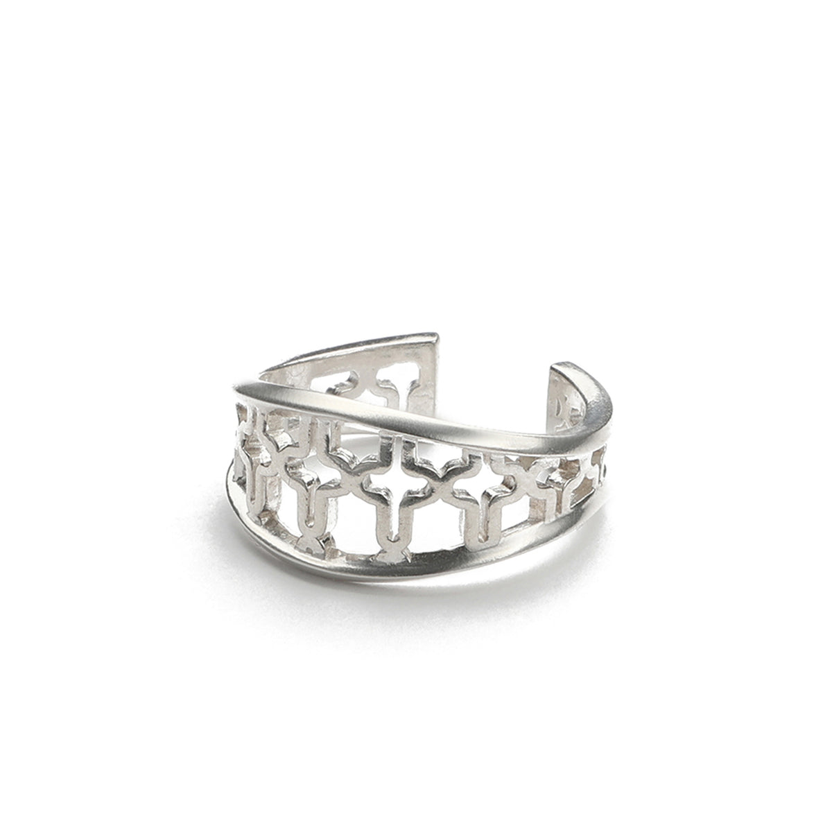 Starlight Ring, an open sterling silver cuff ring with small stars cut through the band